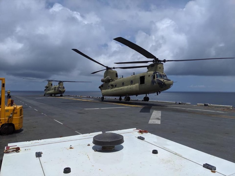 Army CH-47 Chinook lands on the deck of the USS Wasp