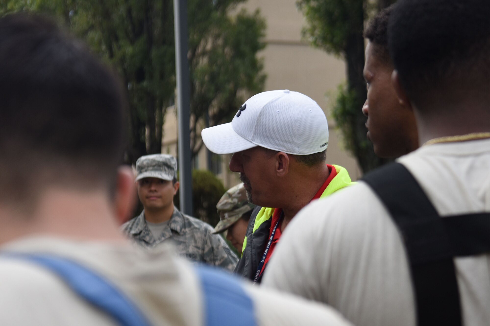 Dan Janssen, Precision Planning and Simulation Inc. instructor, gives feedback to participants in the fuel spill exercise at Osan Air Base, Republic of Korea, October 18, 2019. Janssen travels to over a hundred bases across the globe to administer training exercises like this one to make sure military installations are prepared for the worst case scenario. (U.S. Air Force photo by Staff Sgt. Benjamin Bugenig)