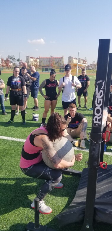 Gina Petrino (far left), a U.S. Army Corps of Engineers, Far East District contract specialist, after she won 2nd place for her weight class at  the 2019 U.S. Army Garrison Humphreys Strongest Warrior competition, at Balboni Field, Camp Humphreys, South Korea, Oct. 19.