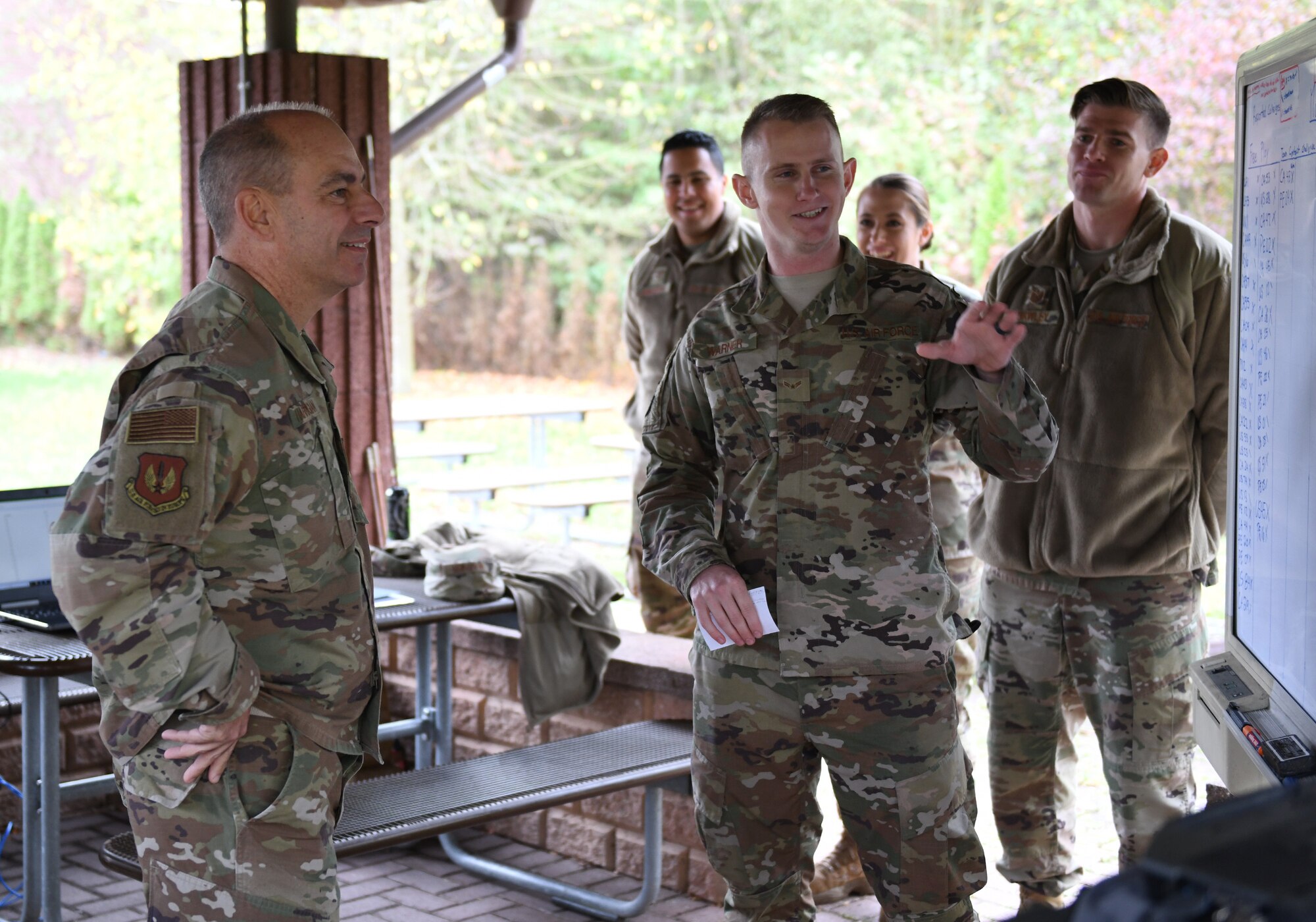 U.S. Air Force Airman 1st Class Bradley Warner, right, 1st Combat Communications Squadron radio frequency transmissions technicians, briefs Gen. Jeff Harrigian, U.S. Air Forces Europe and Air Forces Africa commander, on high-frequency transmissions during an immersion tour at Ramstein Air Base, Germany, Oct. 23, 2019. During the tour, Harrigian learned about Airmen’s innovations and challenges as well as current operations from experts across the 435th Air Ground Operations Wing and the 435th Air Expeditionary Wing. (U.S. Air Force photo by Staff Sgt. Alex Fox Echols III)