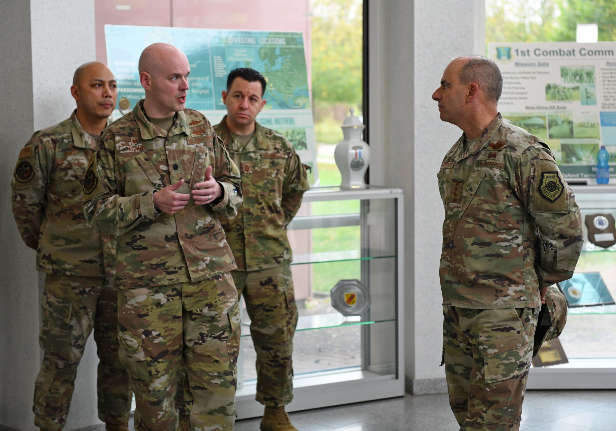 U.S. Air Force Lt. Col. Andrew Adams, 1st Air and Space Communications Squadron commander, briefs Gen. Jeff Harrigian, U.S. Air Forces in Europe and Air Forces Africa commander, during an immersion tour at Ramstein Air Base, Germany, Oct. 23, 2019. During the tour, Harrigian learned about Airmen’s innovations and challenges as well as current operations from experts across the 435th Air Ground Operations Wing and the 435th Air Expeditionary Wing. (U.S. Air Force photo by Staff Sgt. Alex Fox Echols III)
