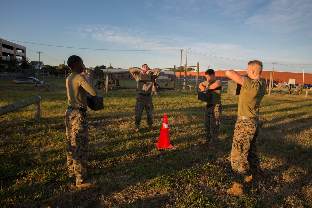 U.S. Marines with U.S. Marine Corps Forces Command participate in during battalion physical training, Oct. 17, 2019, at Camp Elmore, Norfolk, Virginia. The physical training is an ongoing effort to improve physical fitness, while also effectively challenging Marines. (U.S. Marine Corps photo by Cpl. Desmond Martin/released)