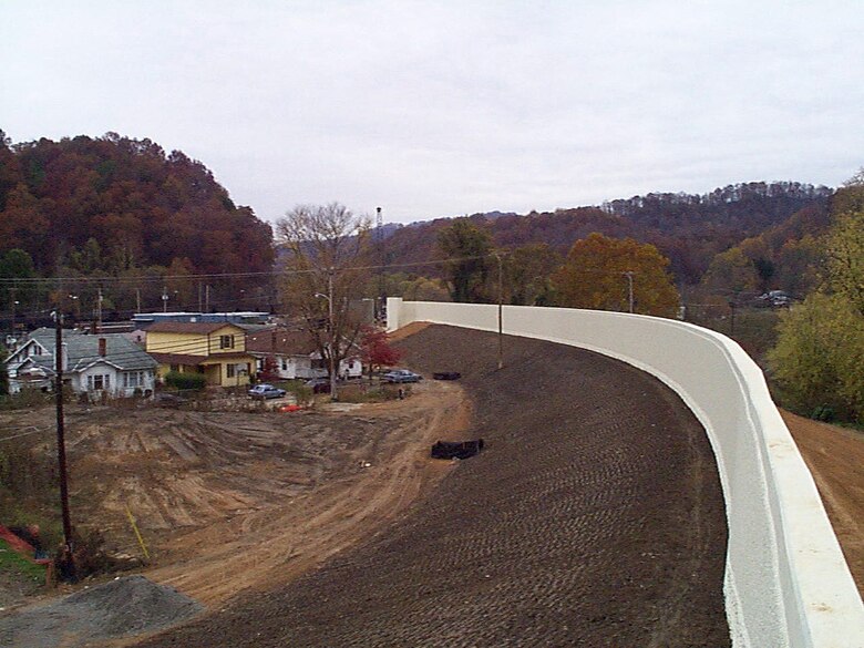 This is a completed portion of the flood wall in Loyall, Ky., Jan. 22, 1999. The U.S. Army Corps of Engineers Nashville District constructed the wall as part of the Harlan Flood Control Project, a decade-long construction project to provide a maximum level of flood protection to the towns of Harlan, Baxter, Loyall and Rio Vista in Harlan County, Kentucky. (USACE Photo)