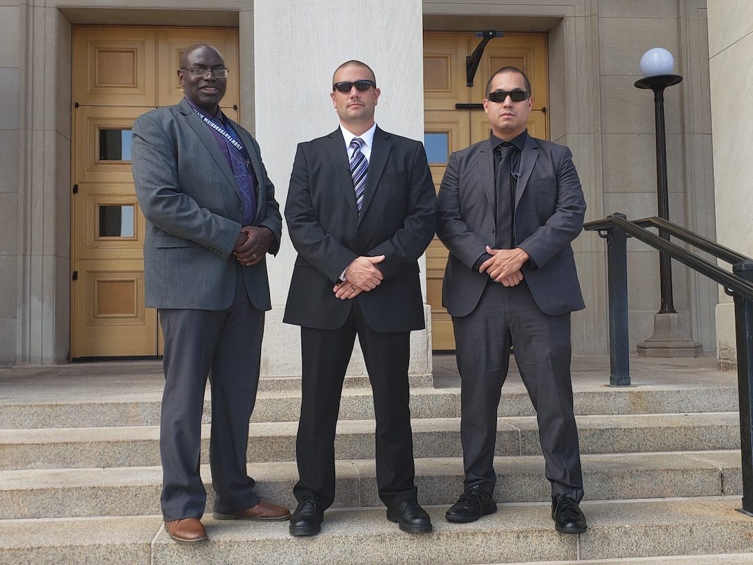 Air Force Office of Special Investigations Special Agents Sean Fishburne and Joseph Sheffer, left and center, and Staff Sgt. Ryan Gomez were selected as members of the new Protective Service Detail (PSD) supporting the standup of the Air Force's 11th Combatant Command, United States Space Command Aug. 29, 2019. (AFOSI photo)
