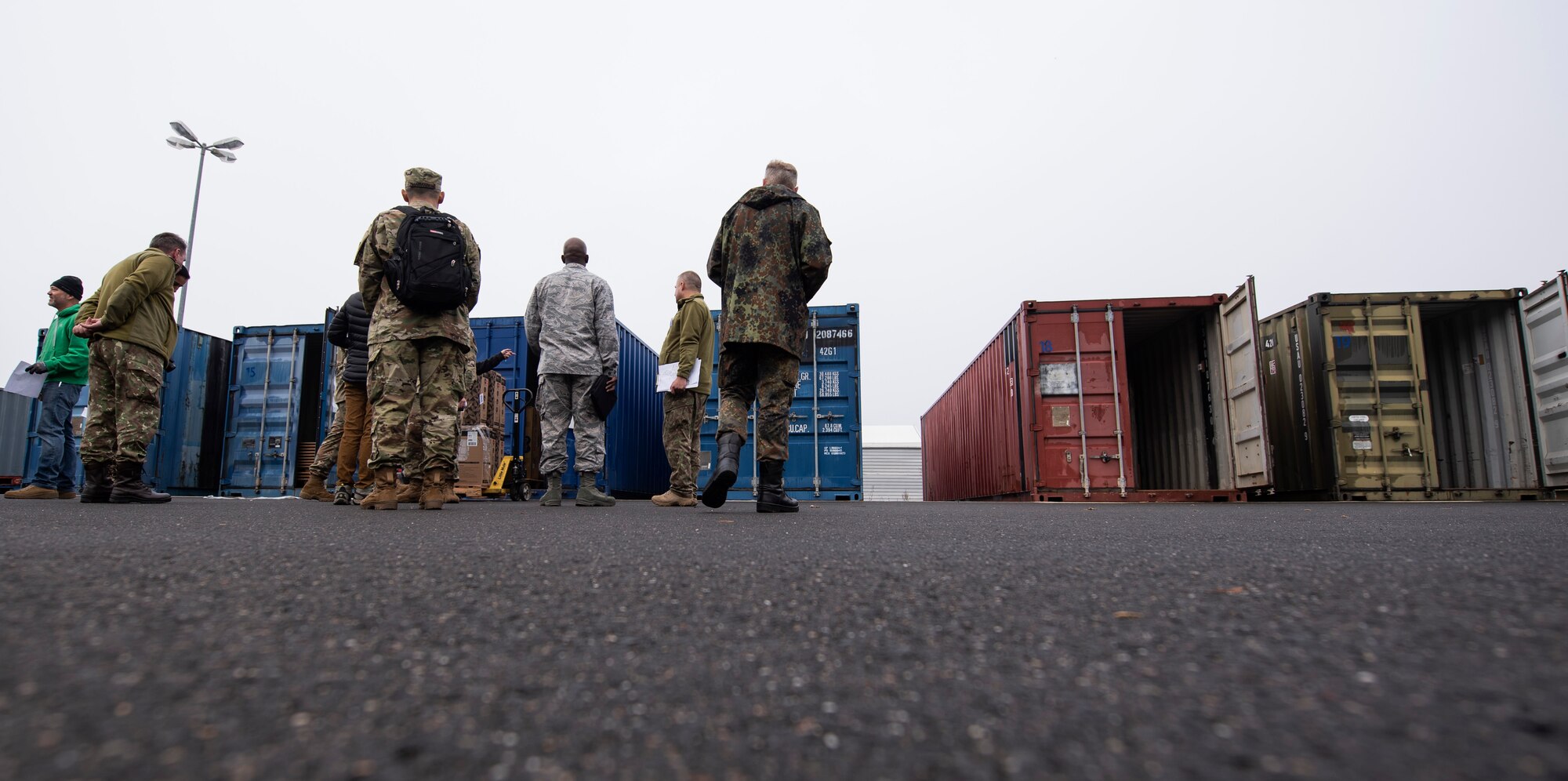 U.S. Air Force Airmen from the 52nd Fighter Wing escort Romanian inspection team members and members of the Defense Threat Reduction Agency during a Conventional Armed Forces in Europe Treaty exercise at Spangdahlem Air Base, Germany, Oct. 24, 2019. The exercise took place to verify readiness of the 52nd FW in the event of a short-notice CFE inspection. Inspectors must be granted access to any facility on the installation with an entryway measuring two meters or more in width, to include containers that measure two meters or more along all dimensions. (U.S. Air Force photo by Airman 1st Class Valerie Seelye)
