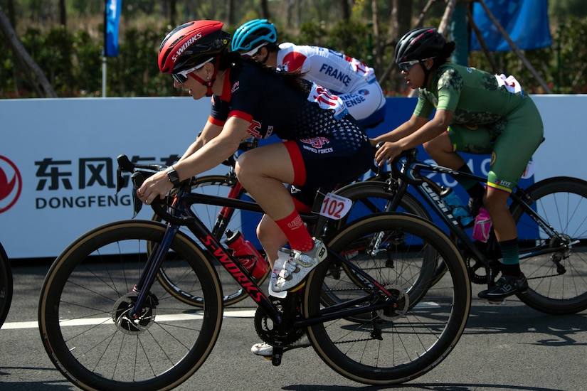 hree cyclists ride together during 50-mile race.