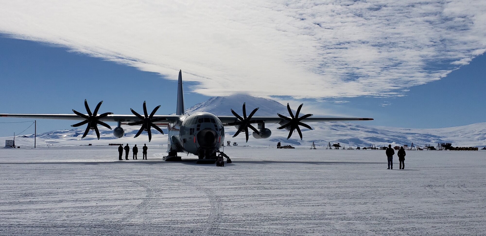 An LC-130 "Skibird” aircraft, assigned to the 109th Airlift Wing, New York Air National Guard, is parked on the flight line between missions at the National Science Foundation research center at McMurdo Station, Antarctica, Dec. 2, 2018. The 109th AW flies the largest ski-equipped aircraft in the world which can land on snow and ice. (Courtesy photo)