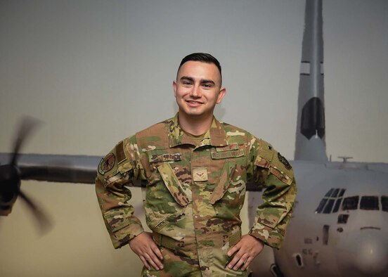 A man in OCPS stands in front of a wall.