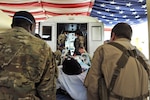 Airmen work with members of the Extracorporeal Membrane Oxygenation team to save the life of a NATO troop at the Craig Joint-Theater Hospital on Bagram Airfield, Afghanistan, Feb. 18, 2016