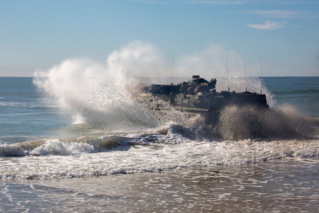 U.S. Marines with the Assault Amphibious Vehicle Platoon, Battalion Landing Team, 2nd Battalion, 8th Marine Regiment, 26th Marine Expeditionary Unit, prepare to splash into the Atlantic Ocean Oct. 12, 2019. The 26th MEU is underway conducting a Composite Training Unit Exercise with the Bataan Amphibious Ready Group.