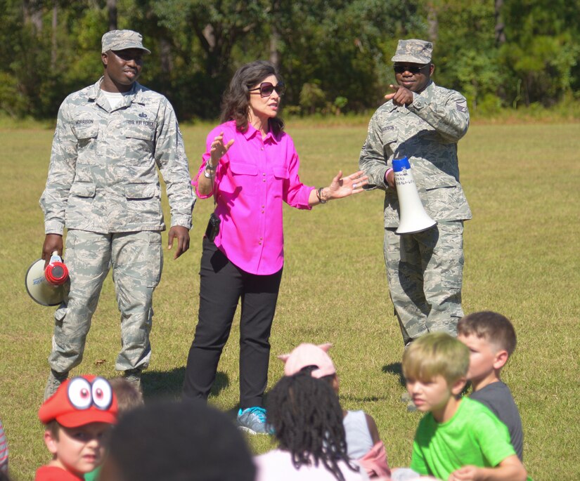 Master Sgt. Maurice Ferguson, a drug demand and reduction program manager assigned to the 315th Aerospace Medical Squadron, Staff Sgt. Christopher Morrison, a program manager with the 628th Force Support Squadron fitness center, and Ann Schuler, a counselor at Marrington Elementary School, speak to the students, October 23, 2019, at Marrington Elementary School on Joint Base Charleston, S.C. Members of Team Charleston were at the school to educate students about Red Ribbon Week and drug prevention. Red Ribbon Week, which takes place October 23-31, is an awareness program that began in 1985 as a way to show opposition to drugs as stated by the Get Smart About Drugs foundation.