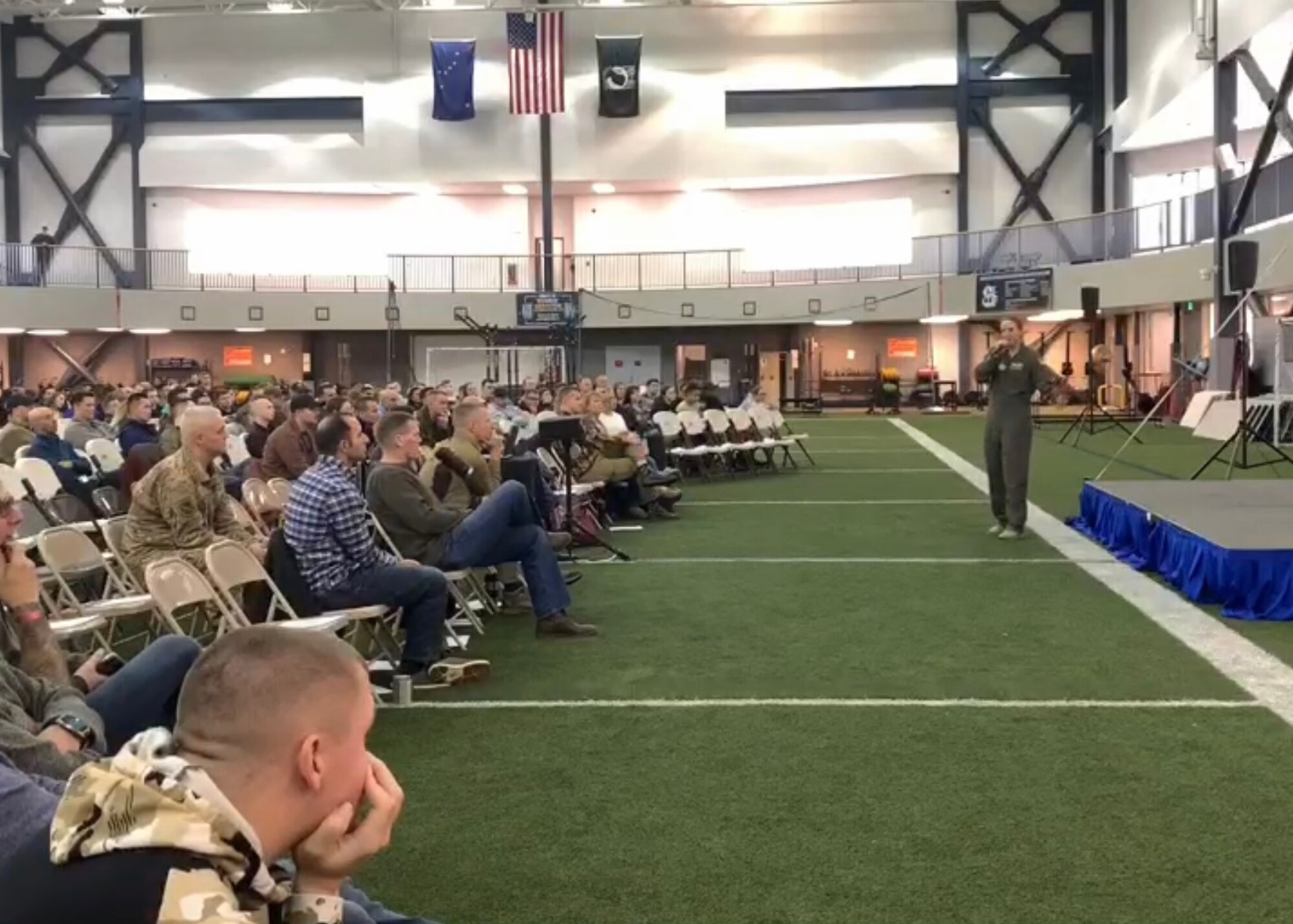 U.S. Air Force Capt. (Dr.) Regan Stiegmann, U.S. Air Force Academy performance medicine and lifestyle medicine physician, addresses the crowd during a resiliency day event at Eielson Air Force Base, Alaska, Oct. 18, 2019.