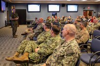 Joint Task Force Civil Support (JTF-CS) Chief of Staff U.S. Marine Col. Tim Powledge addresses the command during an all-hands at the command’s headquarters, where he talked about some of the command’s suggestions and concerns. In order to promote and good and equal working environment, the command also held training from the Langley Equal Opportunity (EO) Office on Joint Base Langley-Eustis, which covered topics such as bullying and hazing, sexual harassment and how to file EO complaints. (Official DoD photo by Mass Communication Specialist 3rd Class Michael Redd/RELEASED)