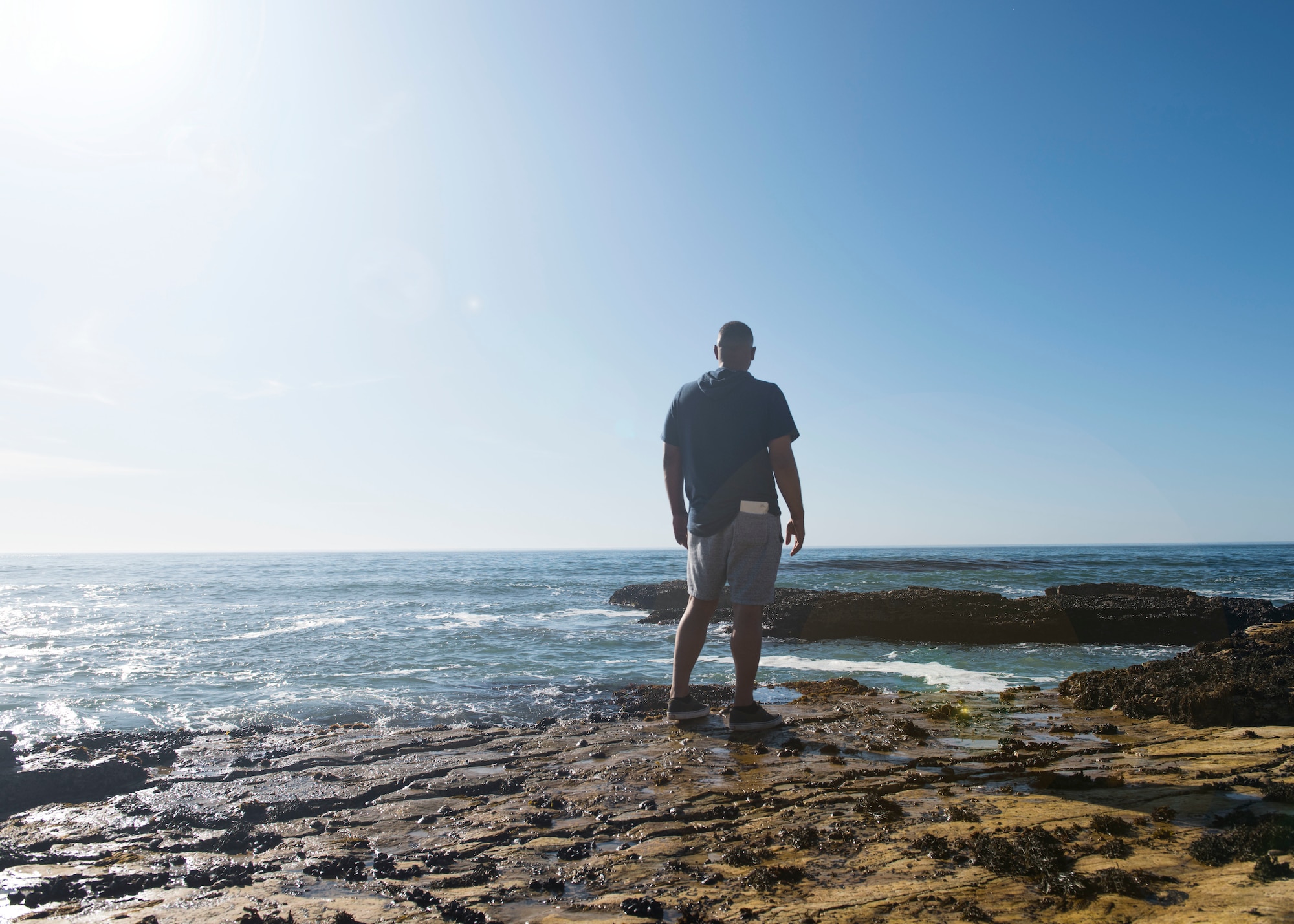 Staff Sgt. Christopher Parise, 576th Flight Test Squadron missile handling evaluator, reflects on a life changing event near Wall Beach Oct. 25, 2019 at Vandenberg Air Force Base, Calif. On Sept. 1, Parise saved a Vietnam veteran, Al Freeman, from nearly dying in the cold ocean waters. Thanks to his military training, Parise knew how to help Al during the dire situation. (U.S. Air Force photo by Airman 1st Class Aubree Milks)