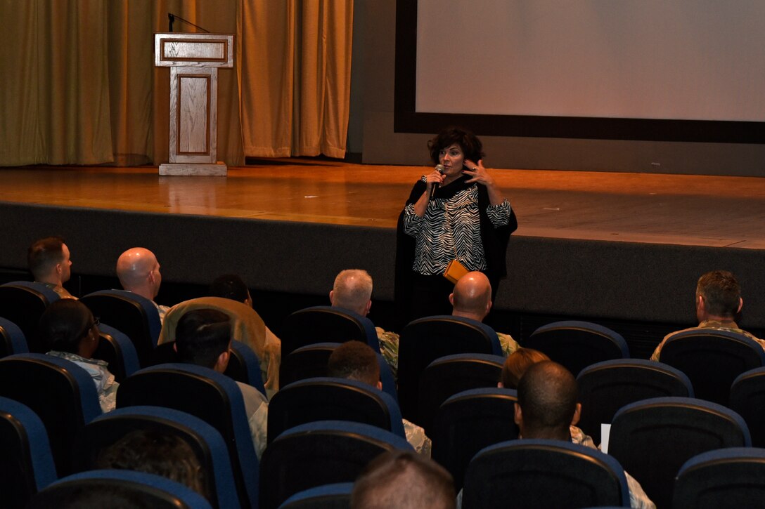 U.S. Air Force Capt. Lance Sijan’s sister, Janine Sijan, speaks to a crowd before sharing her movie ‘Sijan’ at the base theater, Oct. 25, 2019. Her movie provides a more personal look into the life of Lance who posthumously received the Medal of Honor on March 4, 1976. (U.S. Air Force photo by Airman 1st Class Zachary Chapman/Released)
