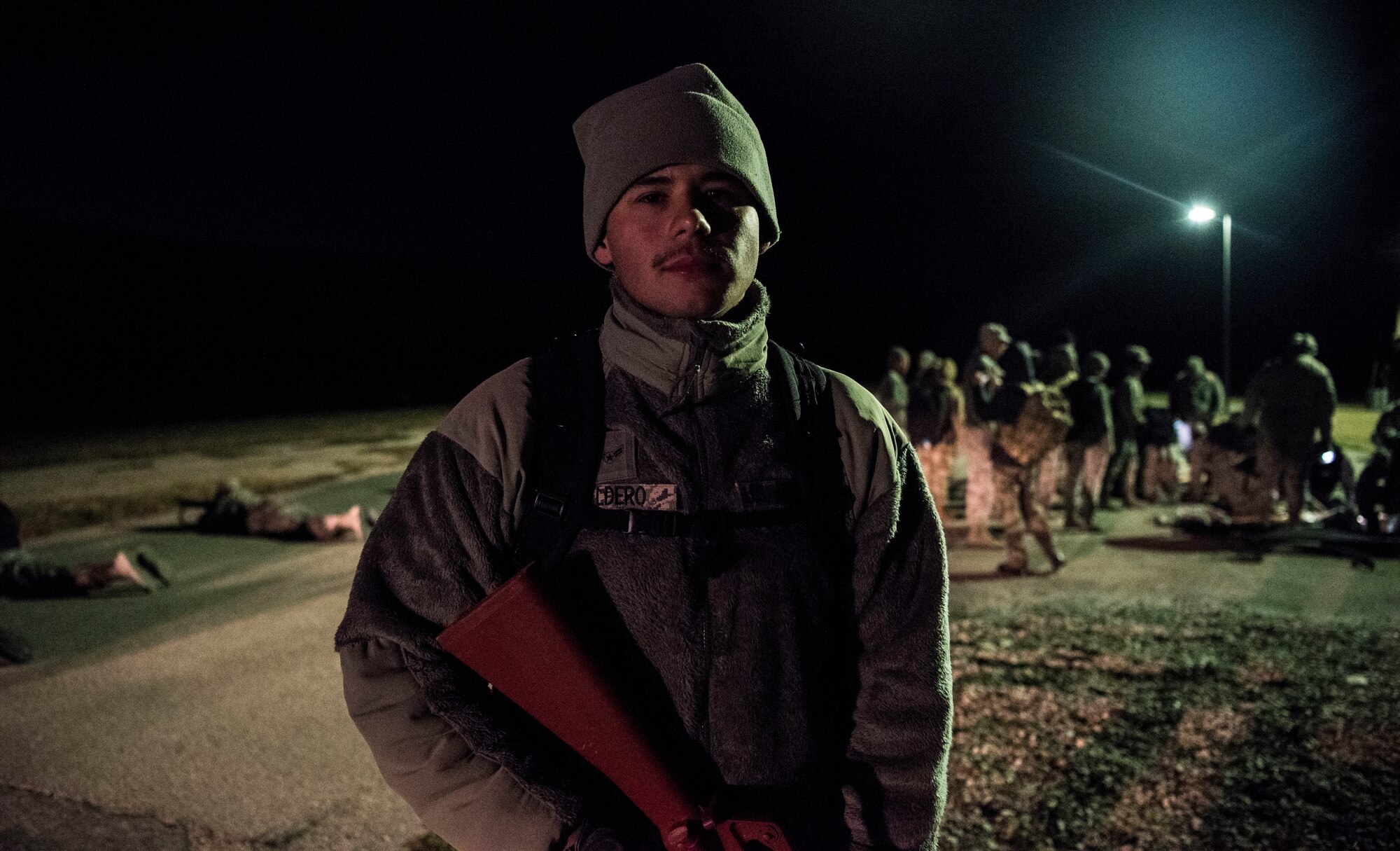 Airman 1st Class Jose Caldero, a 47th Operational Medical Readiness Squadron aerospace and operational physiology technician, participated in a medical readiness training at Laughlin Air Force Base, Texas, Oct. 25, 2019. Caldero is one of approximately 65 medics who spent the early hours of Friday morning improving his readiness skills by playing the role of security during the training. (U.S. Air Force photo by Senior Airman Marco A. Gomez)
