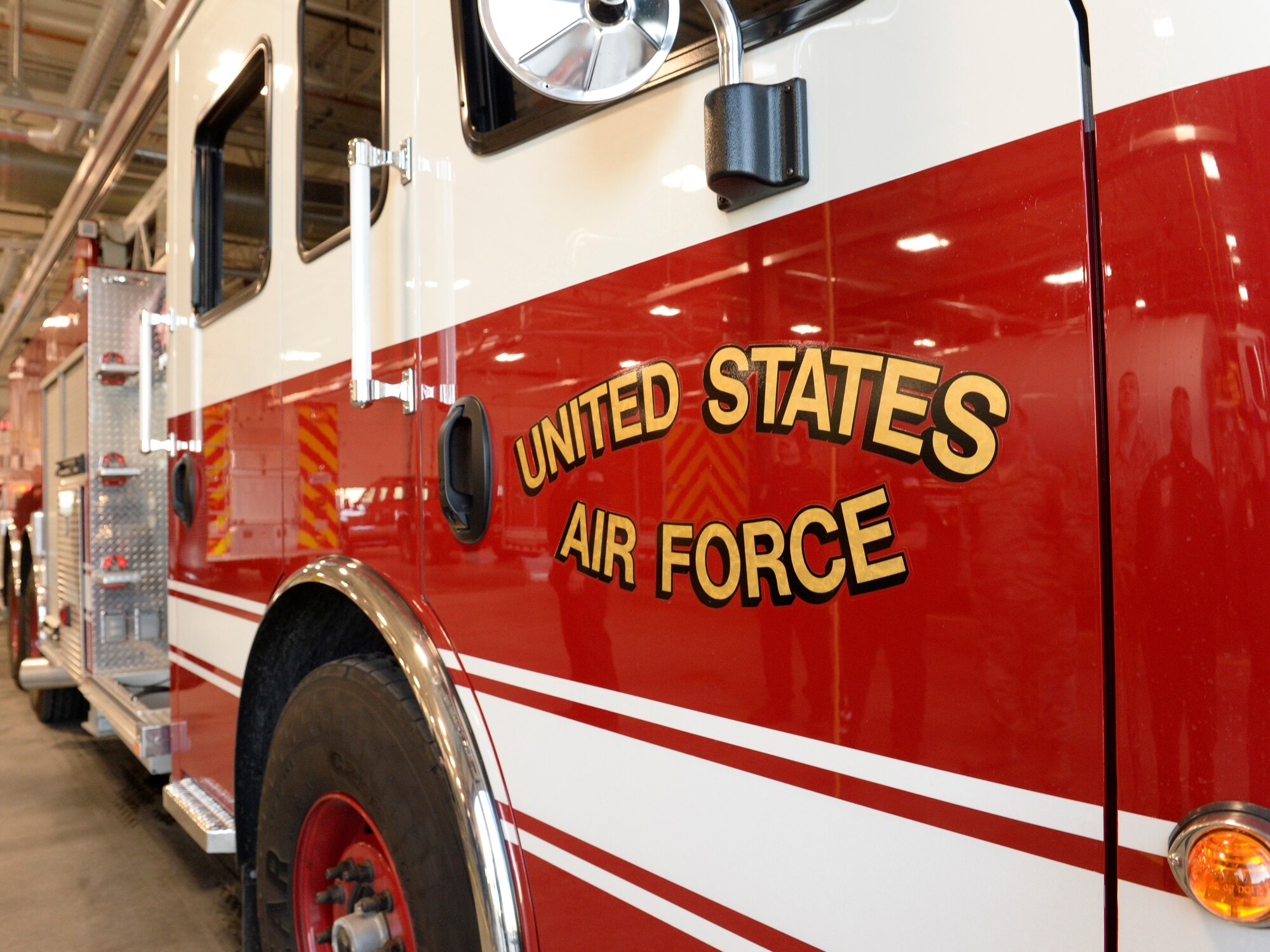Truck 101 sits in a stall at Fire Station 1 following a “wet/wash down and push in” ceremony Oct. 24, 2019, at Hill Air Force Base, Utah. The custom dates back to the 1800s when fire engines were pulled by horses. (U.S. Air Force photo by David Perry)