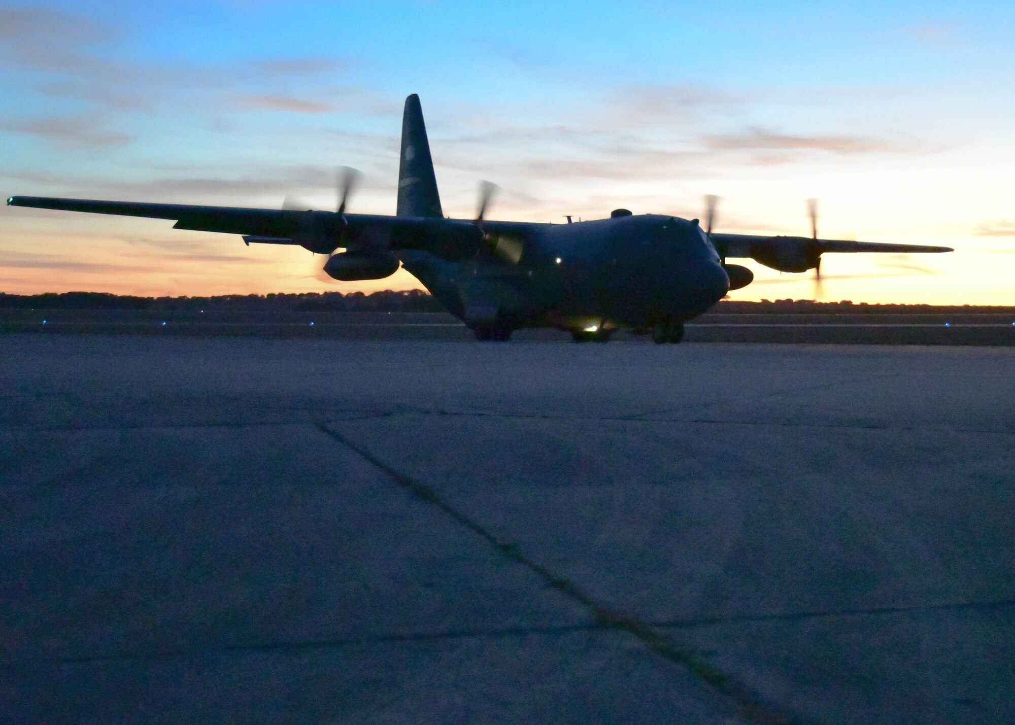 A C-130H3  from the 94th Airlift Wing, Dobbins Air Reserve Base, Georgia, prepares to take off prior to a night flight during Exercise Real Thaw 2019 at Beja Air Base, Portugal, Oct. 2, 2019. Real Thaw is a Portuguese-led multi-lateral flying training exercise where Dobbins provided aerial support. (U.S. Air Force photo/Senior Airman Justin Clayvon)