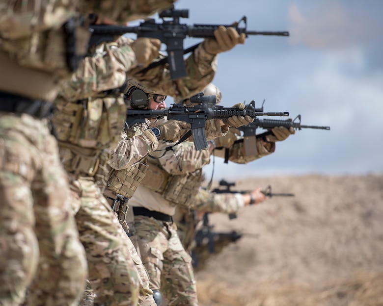Special warfare Airmen fire their M4 carbines during a live-fire exercise
