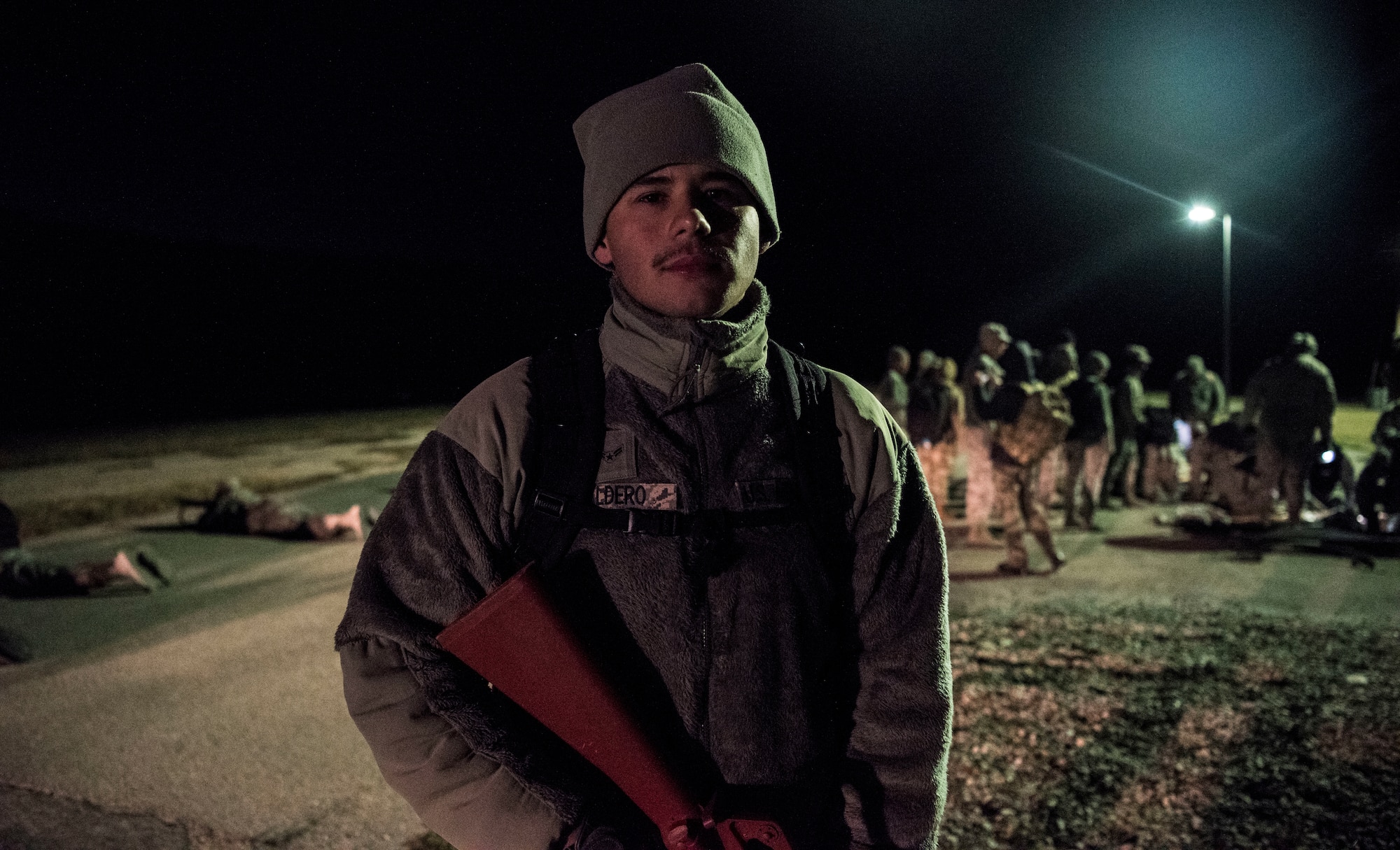 Airman 1st Class Jose Caldero, a 47th Operational Medical Readiness Squadron aerospace and operational physiology technician, participated in a medical readiness training at Laughlin Air Force Base, Texas, Oct. 25, 2019. Caldero is one of approximately 65 medics who spent the early hours of Friday morning improving his readiness skills by playing the role of security during the training. (U.S. Air Force photo by Senior Airman Marco A. Gomez)