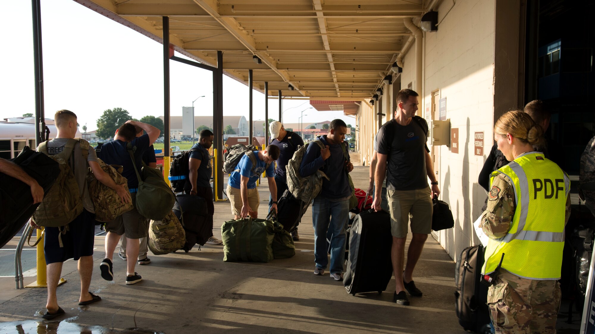 U.S. Air Force Airmen arrive to the 6th Logistics Readiness Squadron for a simulated deployment in-processing exercise, Oct. 21, 2019, at MacDill Air Force Base, Fla.  The 6th Air Refueling Wing conducted an operational readiness exercise to enhance overall mission readiness and standards of each unit on base.