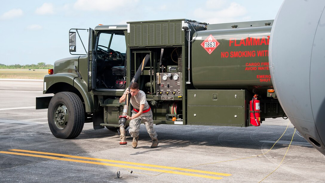 U.S. Air Force Airman 1st Class Jesse Booher, a 6th Logistics Readiness Squadron fuels specialist, drags a fuel pump during an operational readiness exercise, Oct. 24, 2019 at MacDill Air Force Base, Fla. The 6th LRS was tasked with providing fuel support to KC-135 aircraft during the ORE.