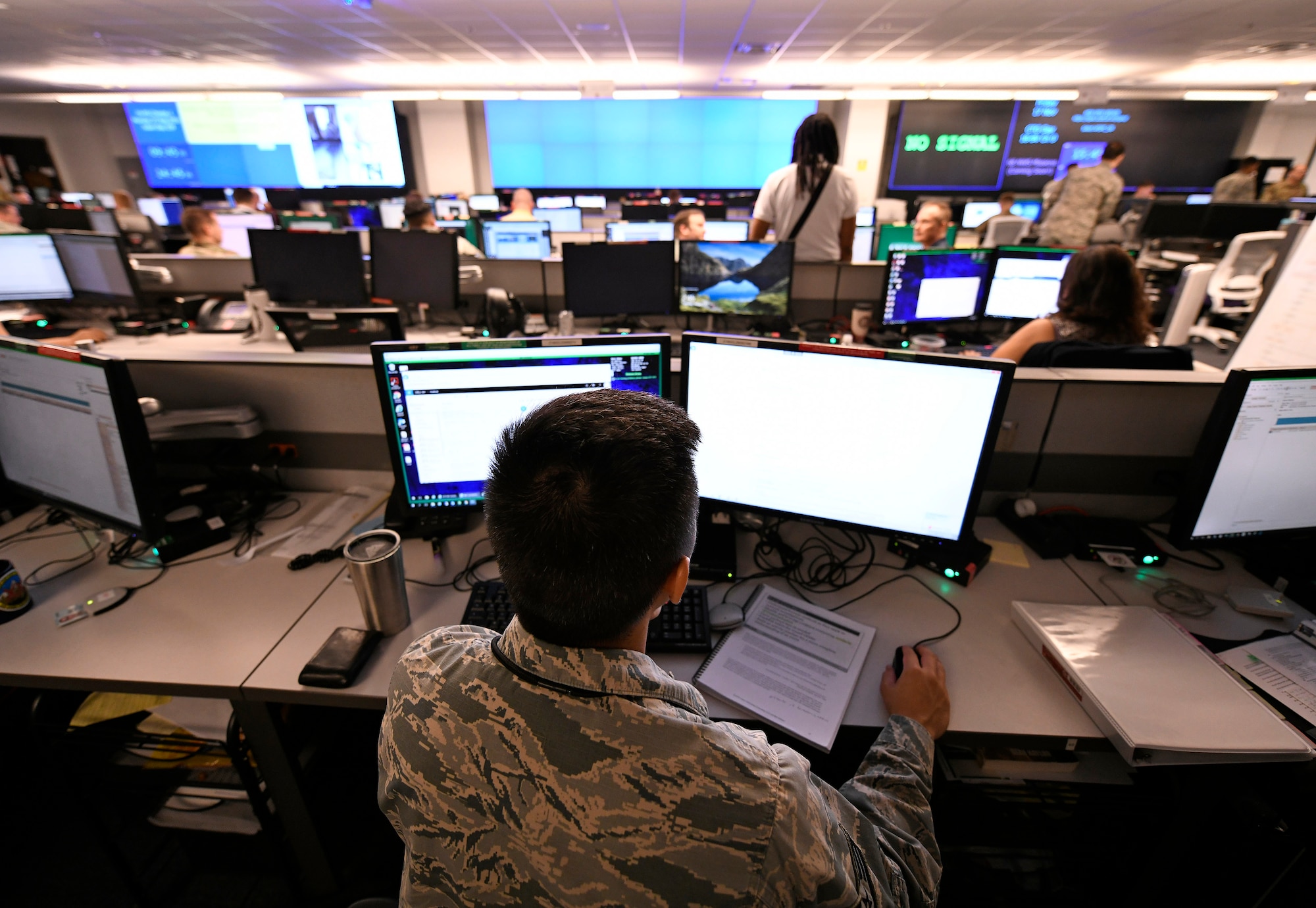 U.S. Air Force Airmen from the 33rd Network Warfare Squadron conduct cyber operations at Joint Base San Antonio-Lackland, Texas, Aug. 27, 2019. The 33rd NWS utilizes a cyber weapon system that employs more than 40 tools and applications. The “12N12” initiative aims to reduce this number to 12 in 12 months. (U.S. Air Force photo by Tech. Sgt. R.J. Biermann)