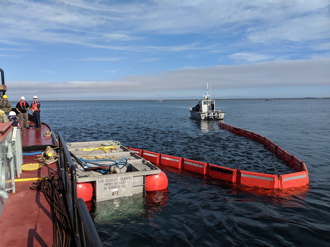 Crews deploy an oil spill skimmer while participating in an exercise as part of the Northwest Oil Spill Control Course. As part of an international cooperation to prepare for a hazardous spill response on Puget Sound, Seattle District participated in the Northwest Oil Spill Control Course hosted by the United States Coast Guard, District 13 August 26-30. (USACE photo by Brad Schultz)