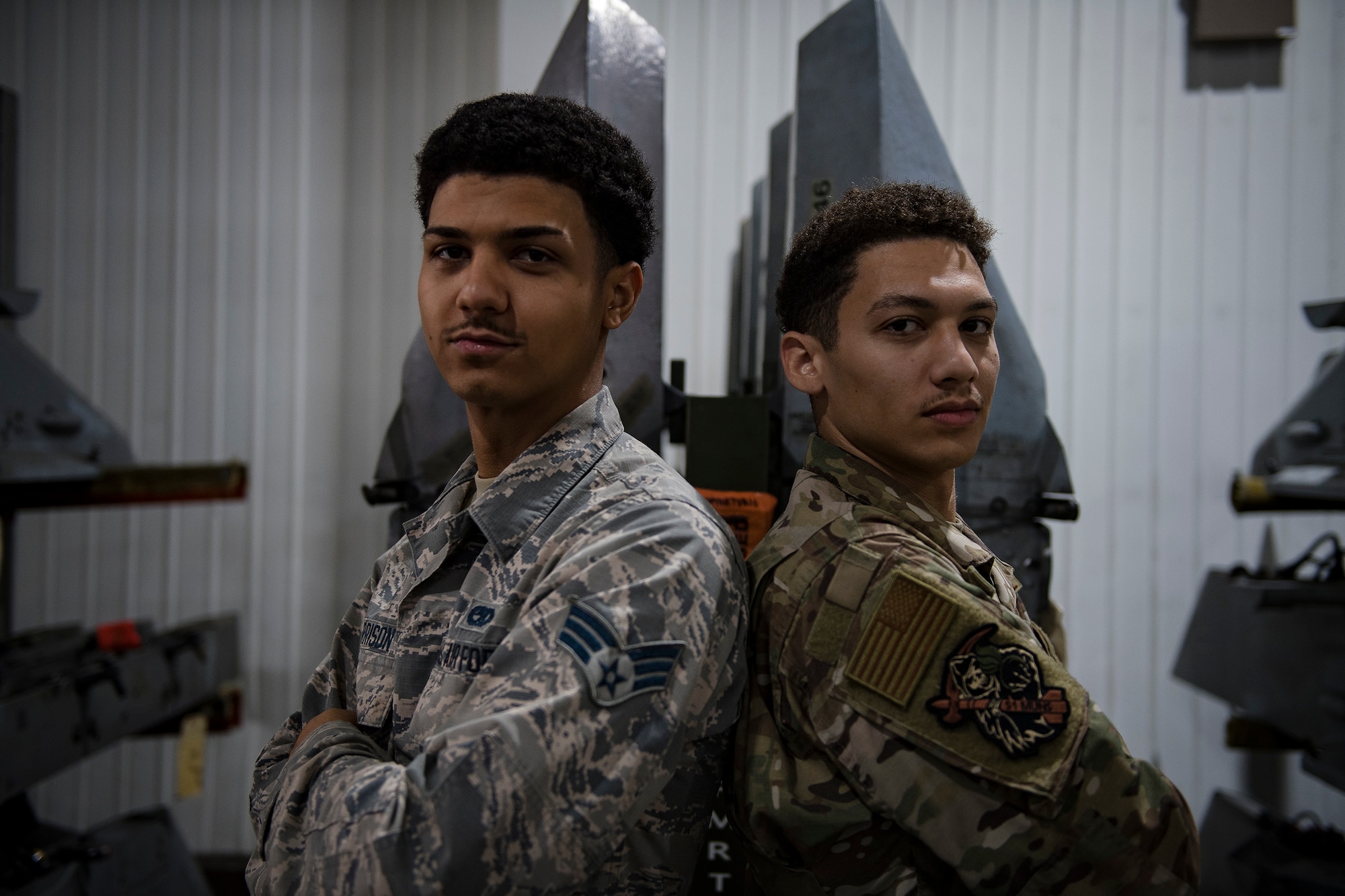 Fraternal twins Jordan and Quinn Harrison, both Senior Airmen from the 51st Munitions Squadron, pose for a photo, Oct. 25, 2019, at Osan Air Base, Republic of Korea.(U.S. Air Force photo by Staff Sgt. Gregory Nash)