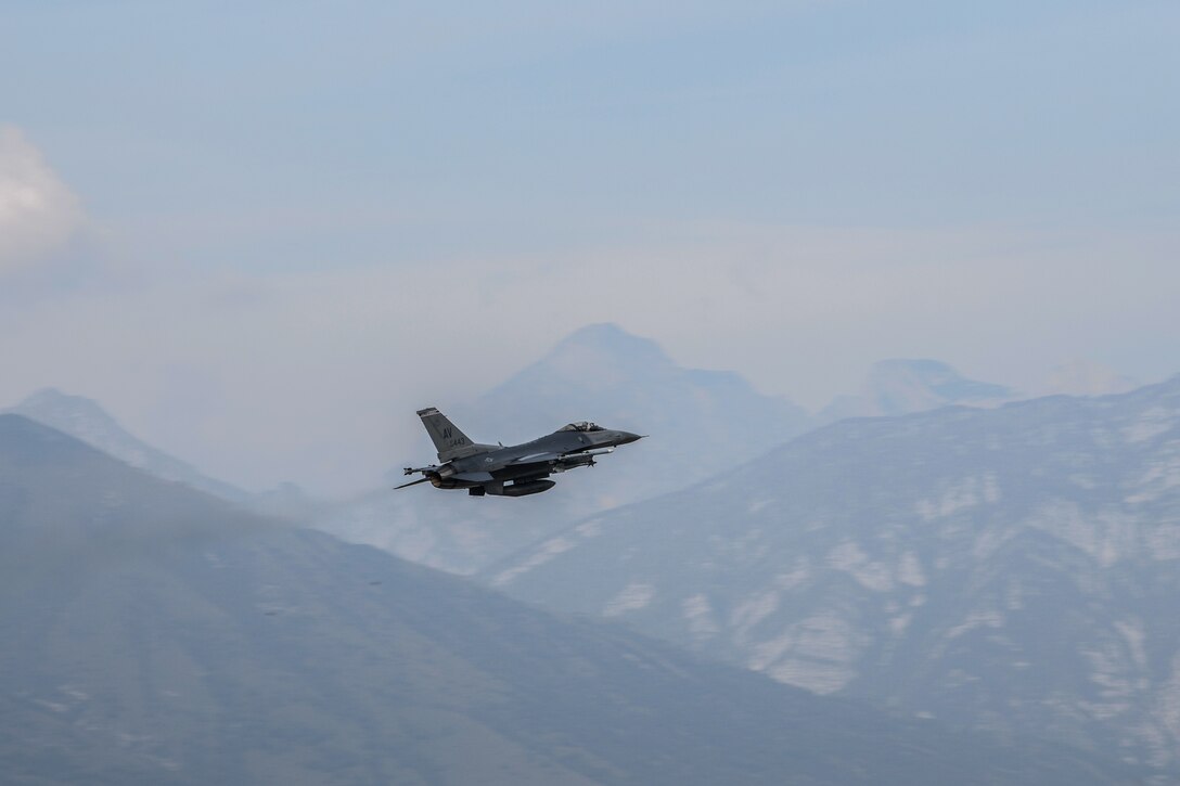 A U.S Air Force F-16 Fighting Falcon from the 555th Fighter Squadron takes flight at Aviano Air Base, Italy, Oct. 24, 2019. The unit performs air and space control and force application roles of counterair, strategic attack, and counterland including interdiction and close-air support in support of the joint, NATO, and combined operations. (U.S. Air Force photo by Airman 1st Class Ericka A. Woolever).