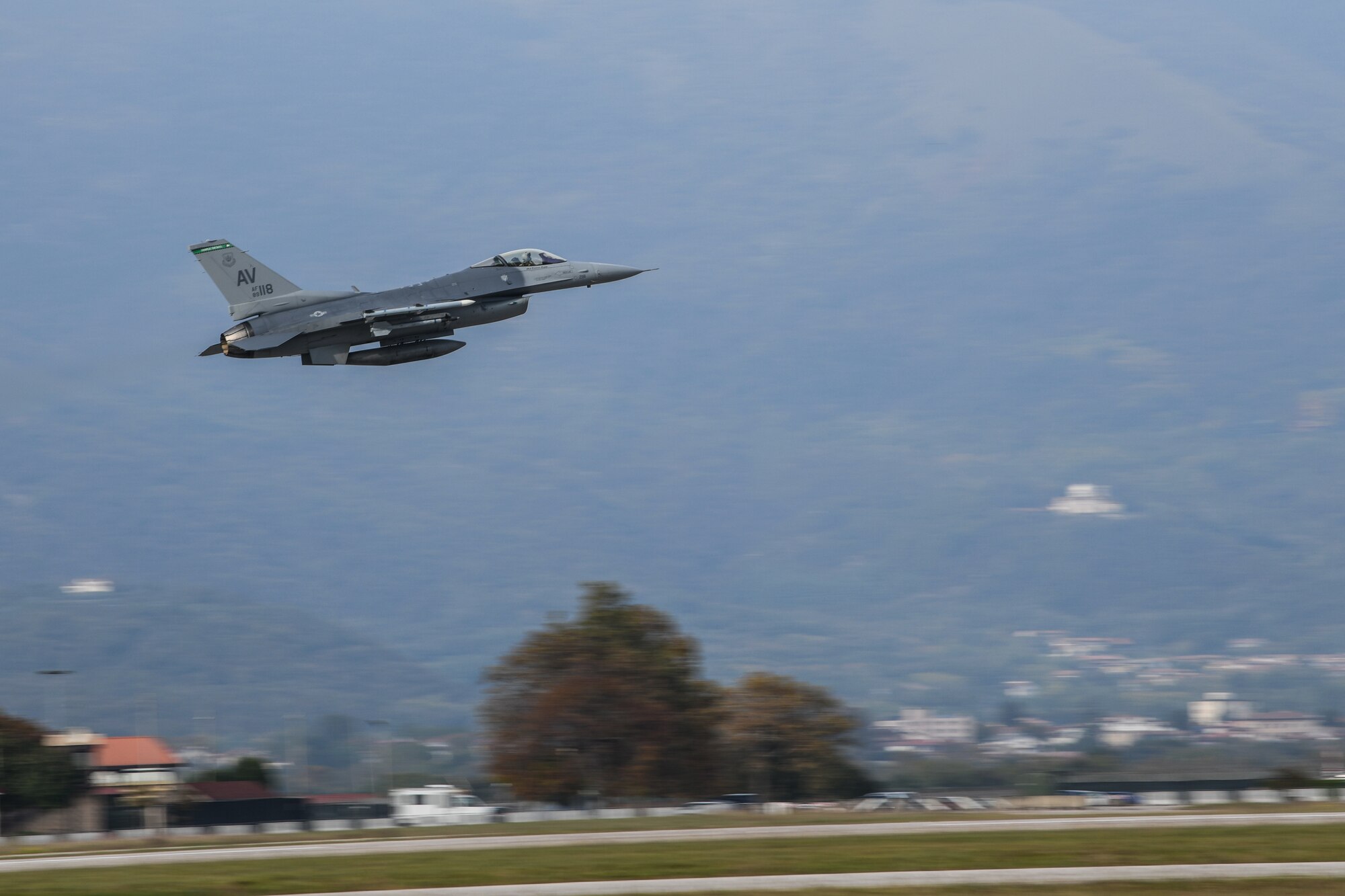 A U.S Air Force F-16 Fighting Falcon from the 555th Fighter Squadron takes flight at Aviano Air Base, Italy, Oct. 24, 2019. The unit performs air and space control and force application roles of counterair, strategic attack, and counterland including interdiction and close-air support in support of the joint, NATO, and combined operations. (U.S. Air Force photo by Airman 1st Class Ericka A. Woolever).