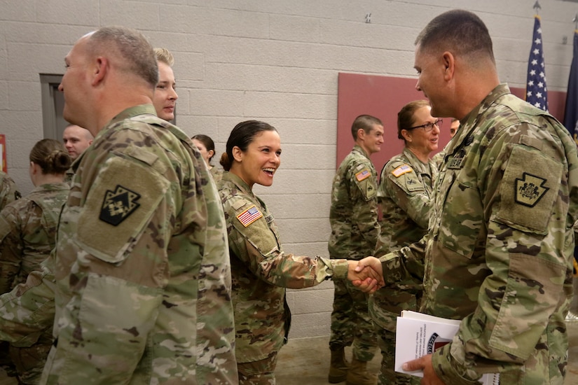 Approximately 20 Soldiers from the Pennsylvania Army National Guard’s 828th Finance Management Support Detachment, 28th Finance Management Support Unit, 728th Combat Support Sustainment Battalion, 213th Regional Support Group take part in a deployment ceremony.