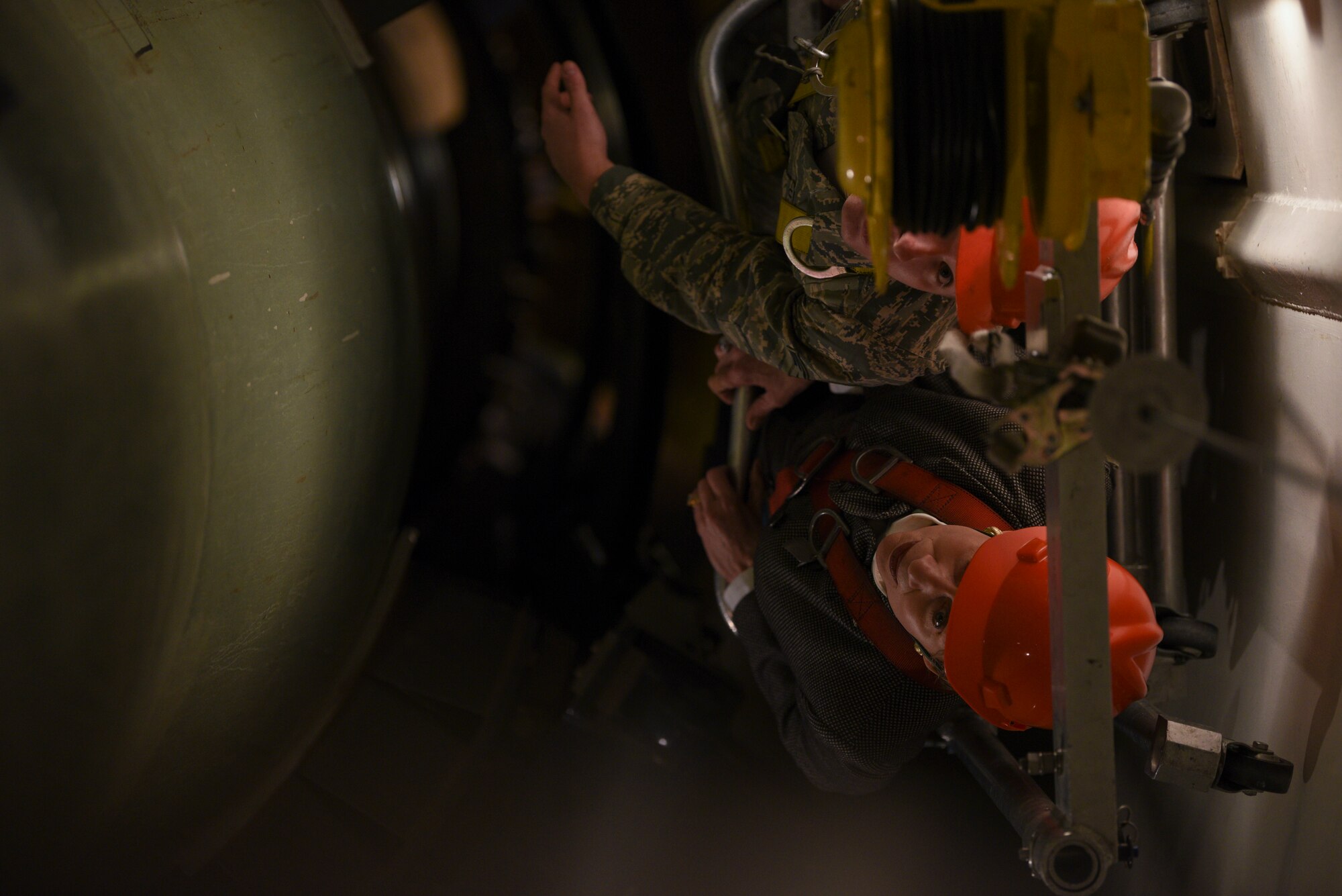 Secretary of the Air Force Barbara Barrett and Senior Airman Zachary Twieg, 90th Missile Maintenance Squadron technician, ride down into U-01 Launch Facility, at F.E. Warren Air Force Base, Wyo., on Oct. 27, 2019. The U-01 launch facility is a training facility used to instruct Airmen on how to do proper missile maintenance.