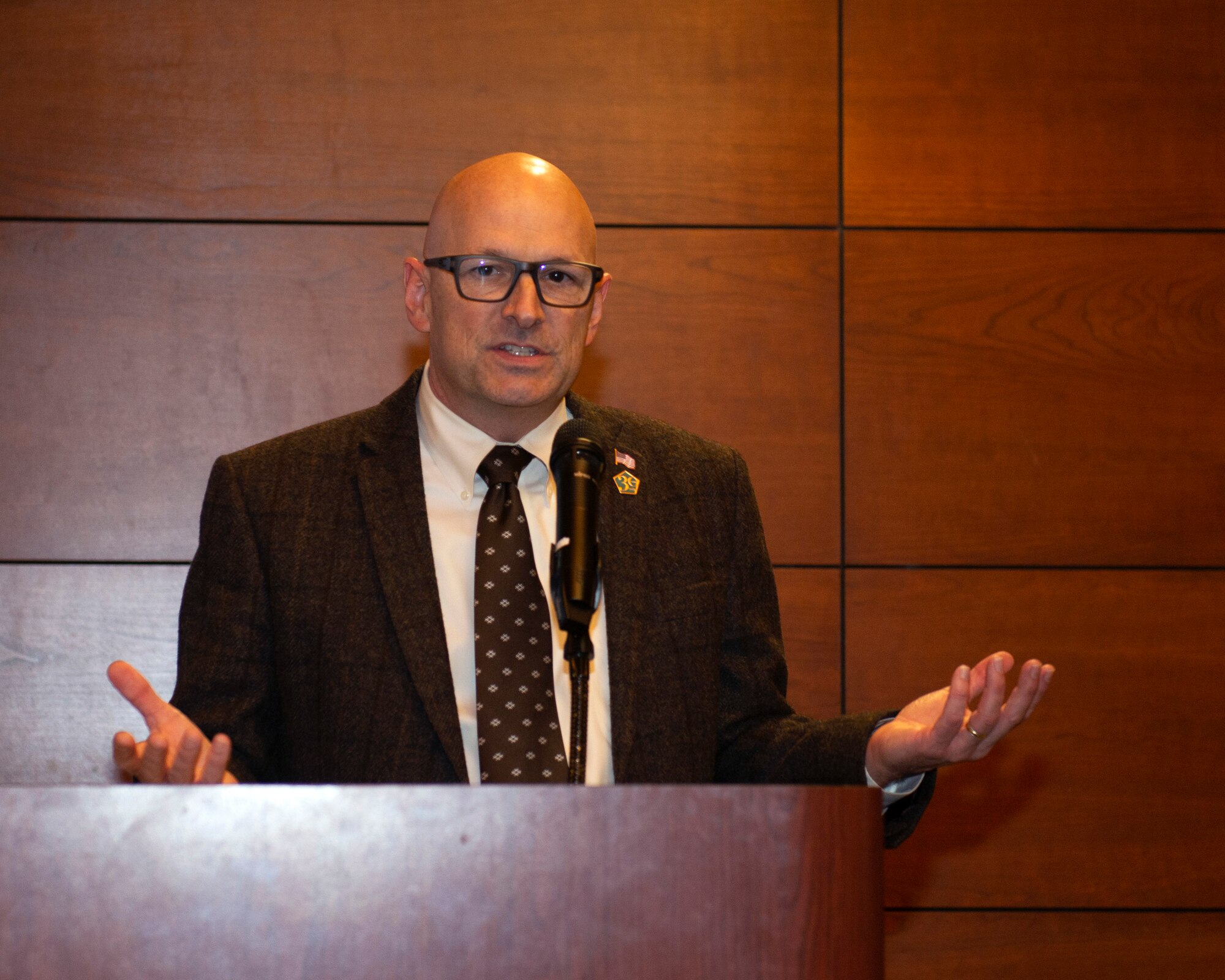 Bryan Longmuir, the director for TRICARE West Regional Support Office Tacoma, gives a Network Provider Briefing during a 673d Medical Group Provider Open House at Joint Base Elmendorf-Richardson, Alaska, Oct. 24, 2019. The event was held to strengthen partnerships between medical providers on and off of the installation.