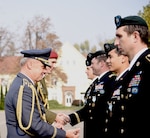 Czech Republic Air Force Maj. Gen. Jiri Verner presents the Medal of the Minister of Defense of Czech Republic to Texas Guardsmen assigned to the Army's 19th Special Forces Group (Airborne), during a ceremony in Prostejov, Oct. 25, 2019, hosted by their state partner, Czech Republic. The unique decoration was for supporting the Czech Allies during combat deployment to Afghanistan as part of Operation Resolute Support.