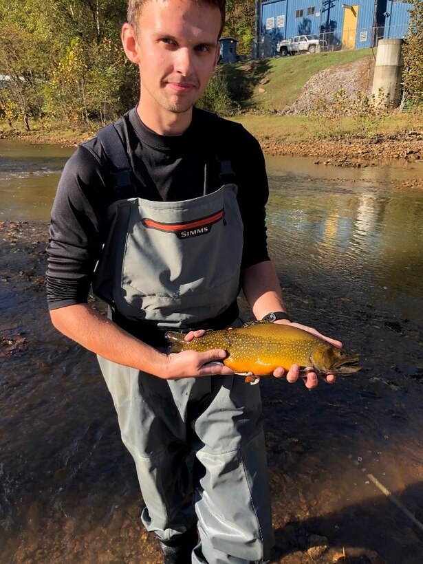 Josh Daugherty displays a beautiful WV brook trout collected below the Dam.