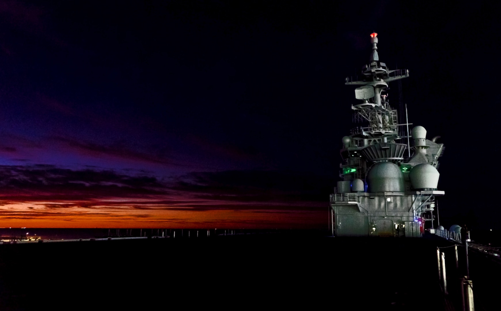 The future USS Tripoli (LHA 7) transits through the Gulf of Mexico in the early morning hours of Oct. 23, 2019 at the beginning of Acceptance Trials.