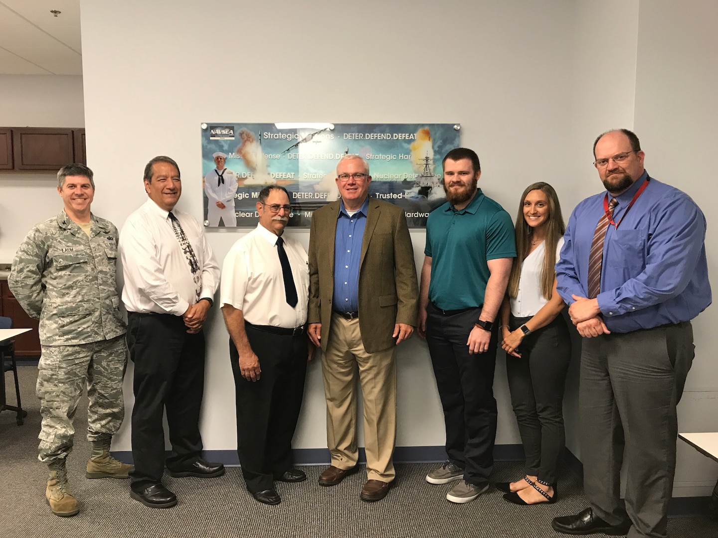 Andrew Steffey, third from right, poses for photo with Mr. Vickers (SES) during his visit to NSWC Crane. Steffey is part of the Pathways Internship Program, which is designed to provide students with opportunities to work and explore Federal careers while still in school. Steffey, who is also currently a senior at USI studying Electrical Engineering, says he was able to put into practice the engineering concepts he is learning at USI.