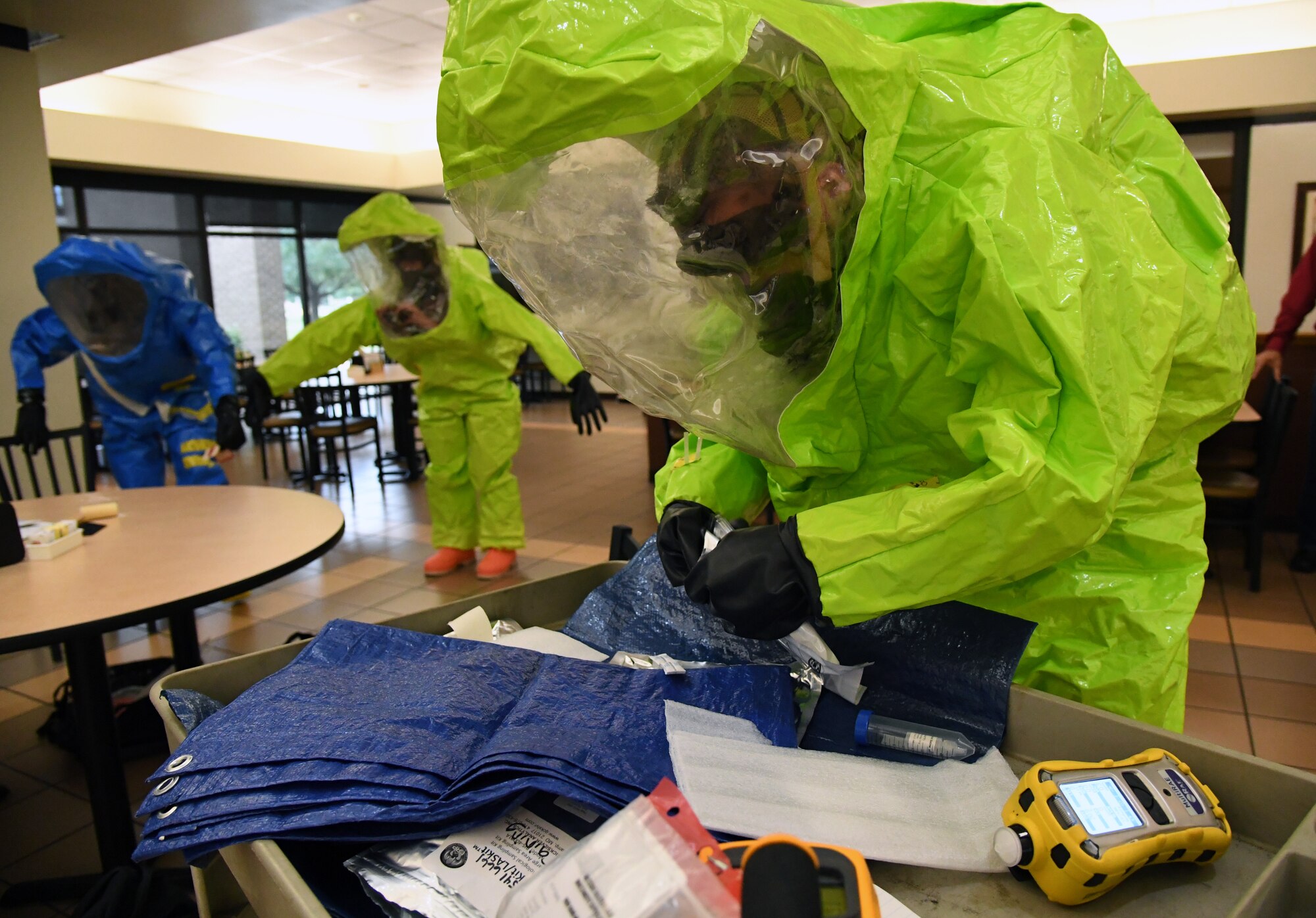 U.S. Air Force Airman 1st Class Matthew Ketterling, 81st Aerospace Medicine Squadron bioenvironmental engineering technician, tests a simulated biological agent during the Anti-Terrorism, Force Protection Condition and Chemical, Biological, Radiological, Nuclear and high-yield Explosives training exercise near the Live Oak Dining Facility at Keesler Air Force Base, Mississippi, Oct. 24, 2019. The exercise scenario simulated a gym bag with ricin found by Keesler personnel who alerted first responders. The exercise was conducted to evaluate the mission readiness and security of Keesler. (U.S. Air Force photo by Kemberly Groue)