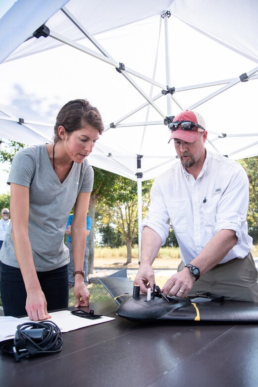 Ryan Strange, right, a research physical scientist with the U.S. Army Corps of Engineers’ Aviation and Remote Systems Program and Huntsville Center’s Unmanned Aircraft Systems Site Development Branch, joins civil engineer Bethanie Thomas as they set up the senseFly eBee X fixed-wing unmanned aircraft system before takeoff outside the U.S. Army Engineering and Support Center, Huntsville, Alabama, Oct. 1, 2019. Thomas is also part of the Unmanned Aircraft Systems Site Development Branch, which is part of Huntsville Center’s Engineering Directorate.