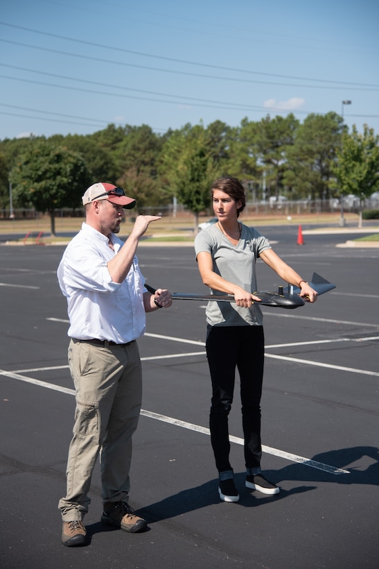 Ryan Strange, left, a research physical scientist with the U.S. Army Corps of Engineers’ Aviation and Remote Systems Program and Huntsville Center’s Unmanned Aircraft Systems Site Development Branch, gives civil engineer Bethanie Thomas a few final recommendations before she launches the senseFly eBee X fixed-wing unmanned aircraft system into the air outside the U.S. Army Engineering and Support Center, Huntsville, Alabama, Oct. 1, 2019. Thomas is also part of the Unmanned Aircraft Systems Site Development Branch, which is part of Huntsville Center’s Engineering Directorate.