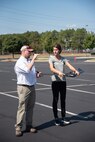 Ryan Strange, left, a research physical scientist with the U.S. Army Corps of Engineers’ Aviation and Remote Systems Program and Huntsville Center’s Unmanned Aircraft Systems Site Development Branch, gives civil engineer Bethanie Thomas a few final recommendations before she launches the senseFly eBee X fixed-wing unmanned aircraft system into the air outside the U.S. Army Engineering and Support Center, Huntsville, Alabama, Oct. 1, 2019. Thomas is also part of the Unmanned Aircraft Systems Site Development Branch, which is part of Huntsville Center’s Engineering Directorate.