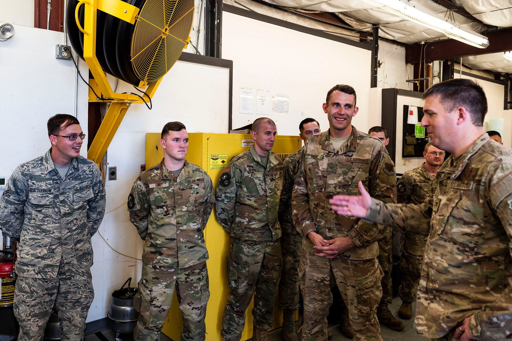 Col. Dan Walls, right, 23d Wing commander, speaks to Airman 1st Class Tyler Quattlebaum, far left, 23d Maintenance Squadron (MXS) munitions support equipment maintenance technician, during an immersion tour Oct. 28, 2019, at Moody Air Force Base, Ga. Walls toured the 23d MXS munitions flight facilities, where the Airmen showcased their squadron and mission. This gave Walls the opportunity to see how 23d MXS improves deployability and ensures mission readiness. (U.S. Air Force photo by Senior Airman Erick Requadt)
