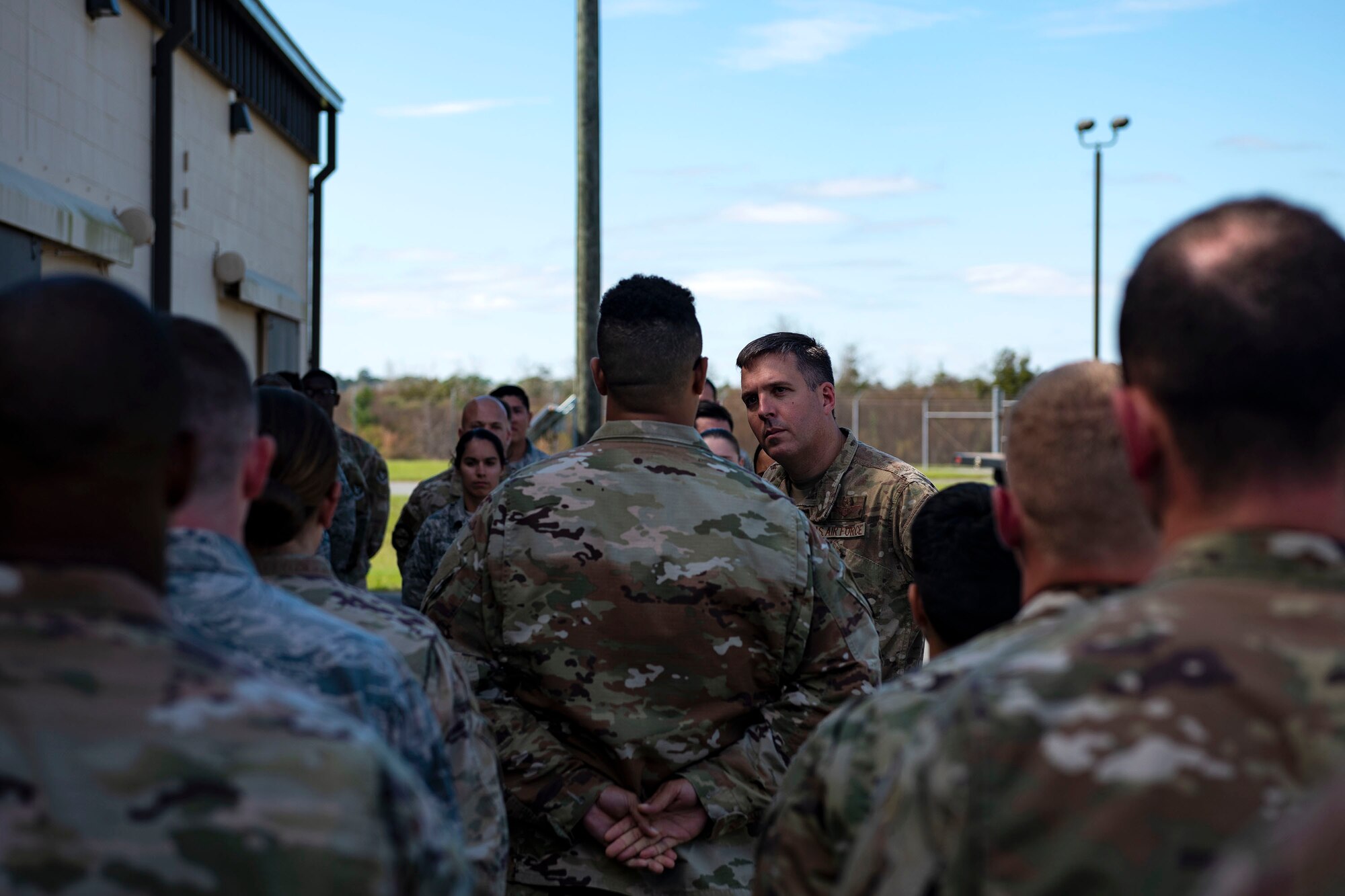 Col. Dan Walls, center, 23d Wing commander, talks with Airmen assigned to the 23d Maintenance Squadron (MXS) during an immersion tour Oct. 28, 2019, at Moody Air Force Base, Ga. Walls toured the 23d MXS munitions flight facilities, where the Airmen showcased their squadron and mission. This gave Walls the opportunity to see how 23d MXS improves deployability and ensures mission readiness. (U.S. Air Force photo by Senior Airman Erick Requadt)