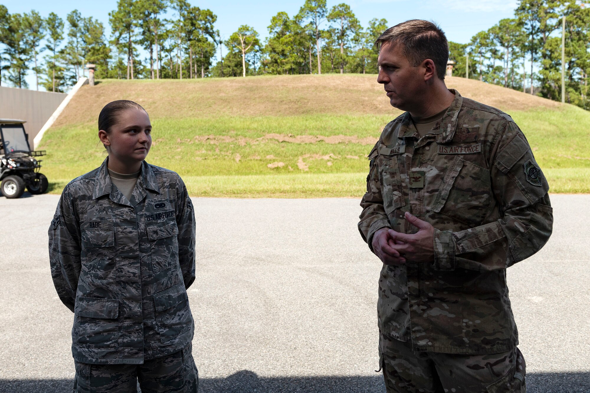 Col. Dan Walls, right, 23d Wing commander, speaks to Airman 1st Class Lindlie Rabe, 23d Maintenance Squadron (MXS) stockpile management technician, during an immersion tour Oct. 28, 2019, at Moody Air Force Base, Ga. Walls toured the 23d MXS munitions flight facilities, where the Airmen showcased their squadron and mission. This gave Walls the opportunity to see how 23d MXS improves deployability and ensures mission readiness. (U.S. Air Force photo by Senior Airman Erick Requadt)