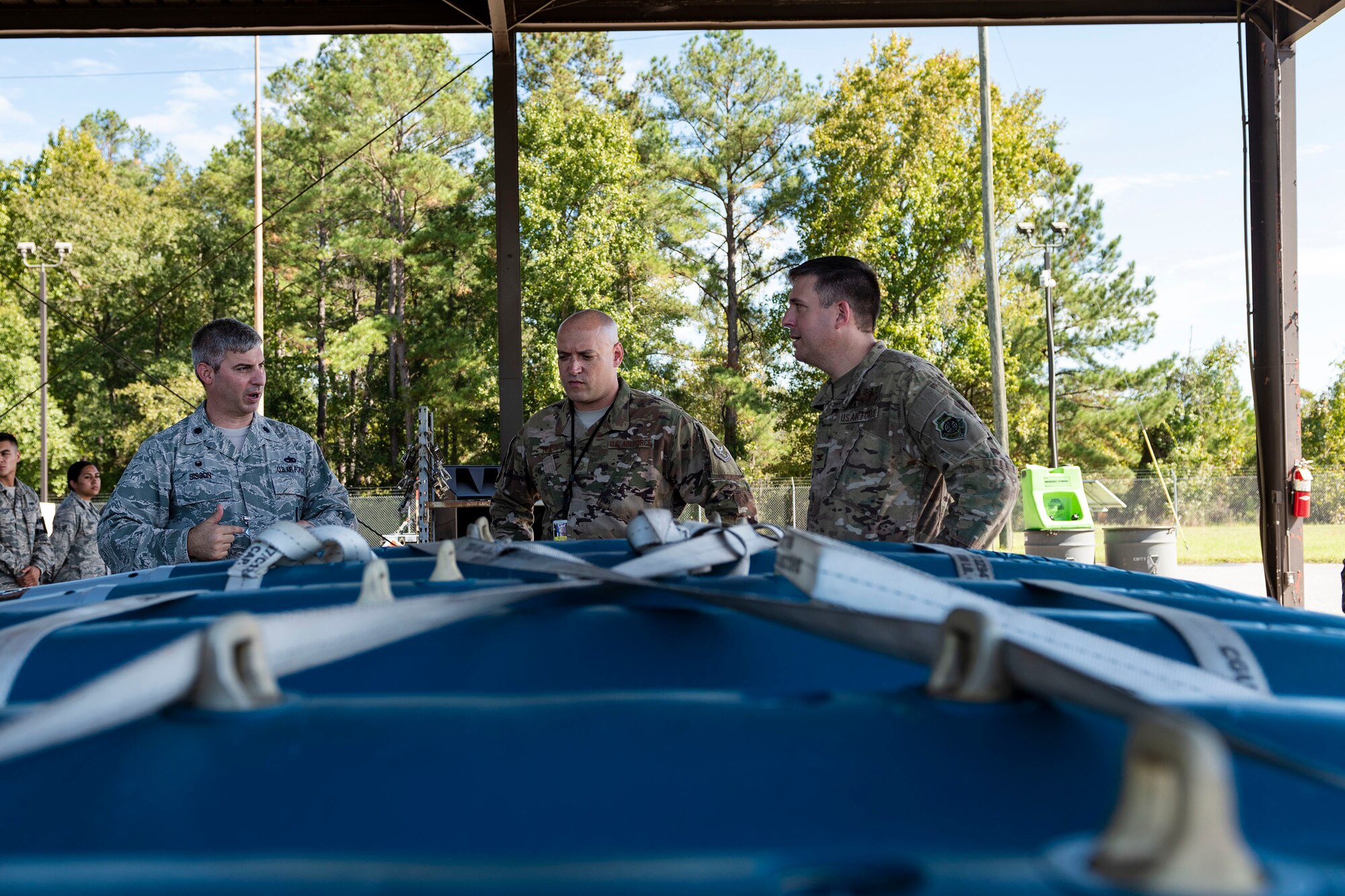 Col. Dan Walls, right, 23d Wing commander, speaks to 23d Maintenance Squadron (MXS) leadership during an immersion tour Oct. 28, 2019, at Moody Air Force Base, Ga. Walls toured the 23d MXS munitions flight facilities, where the Airmen showcased their squadron and mission. This gave Walls the opportunity to see how 23d MXS improves deployability and ensures mission readiness. (U.S. Air Force photo by Senior Airman Erick Requadt)