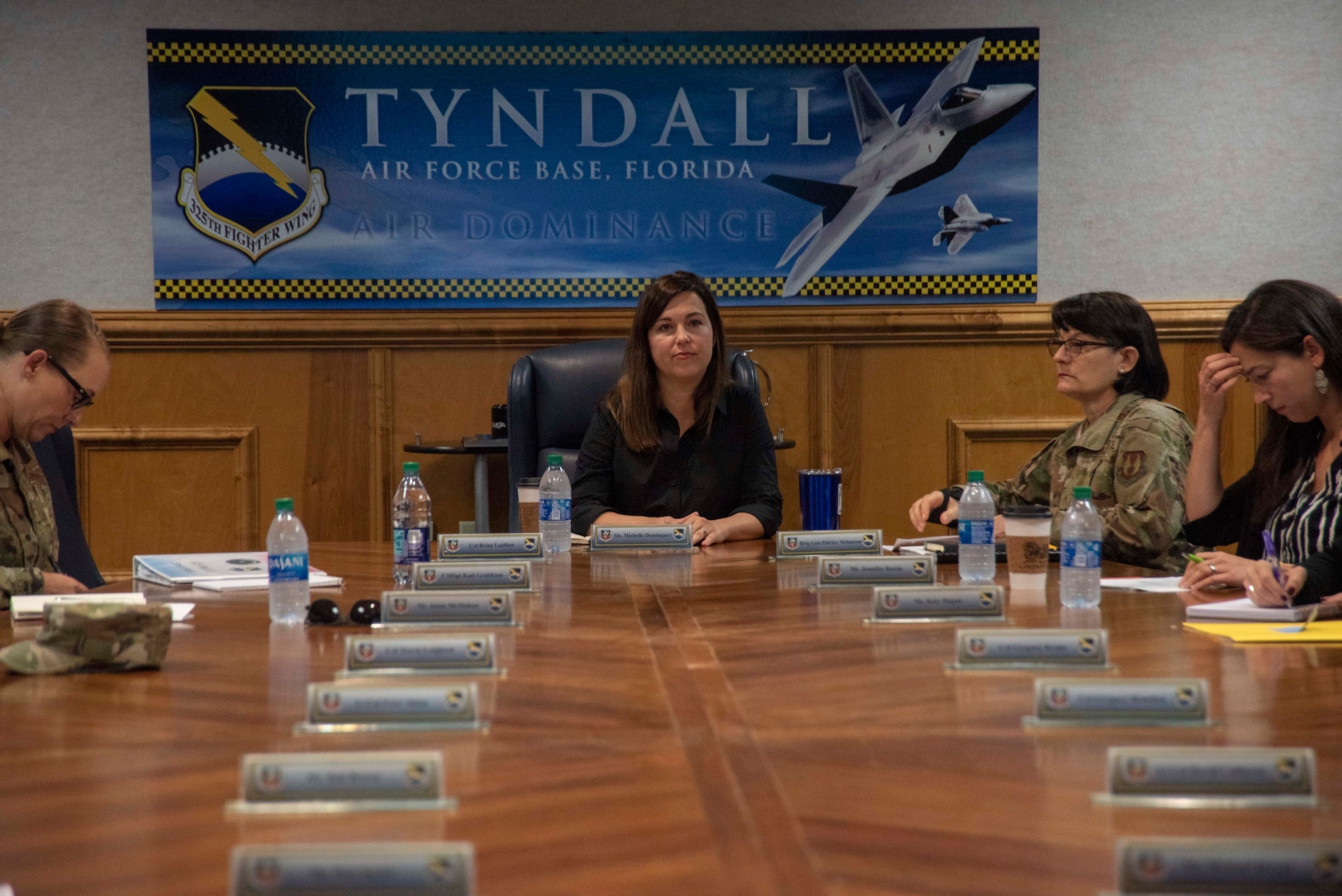 Michelle Dominguez, Clerk, Senate Appropriations Committee-M, attends a 325th Fighter Wing Hurricane Michael recovery and rebuild update briefing on Oct. 28, 2019, at Tyndall Air Force Base, Florida. Dominguez, along with other professional staff members, received a briefing from Col. Brian Laidlaw, 325th FW commander, regarding the progress Tyndall had made since the devastation caused from Hurricane Michael in 2018. Laidlaw said the base is back to having 90 percent of the missions, conducted by 80 percent of the personnel, utilizing 50 percent of the facilities. (U.S. Air Force photo by Staff Sgt. Magen M. Reeves)