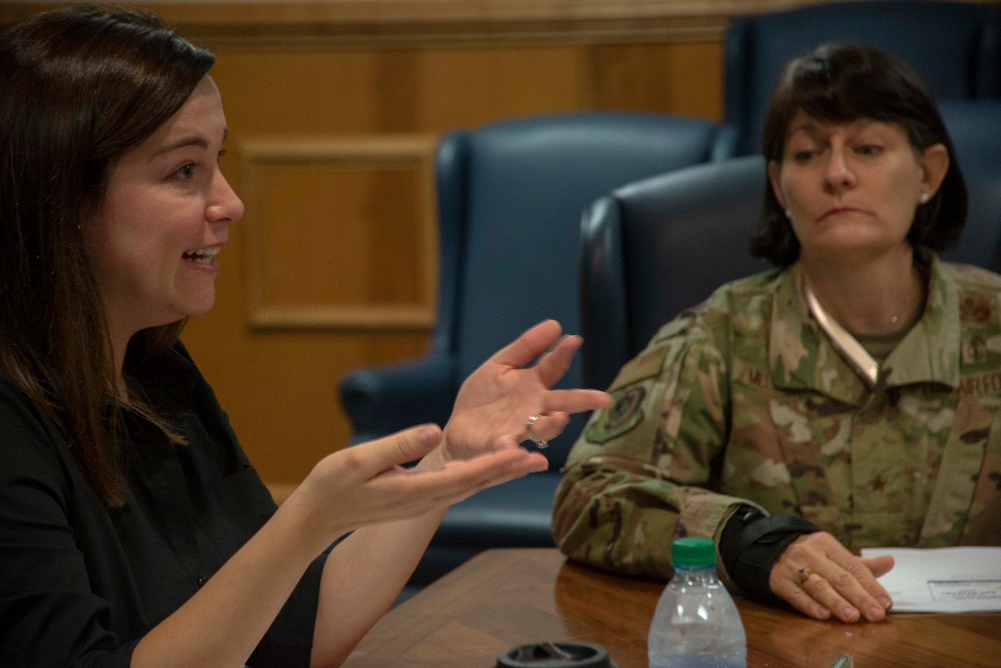 Michelle Dominguez, Clerk, Senate Appropriations Committee-M, left, and Brig. Gen. Patrice Melancon, Executive Director, Tyndall Program Management Office, right, attend a 325th Fighter Wing Hurricane Michael recovery and rebuild update on Oct. 28, 2019, at Tyndall Air Force Base, Florida. Dominquez, along with other professional staff members, received a briefing from Col. Brian Laidlaw, 325th FW commander, regarding the progress Tyndall has made since the devastation caused from Hurricane Michael in 2018. Laidlaw said the base is back to having 90 percent of the missions, conducted by 80 percent of the personnel, utilizing 50 percent of the facilities. (U.S. Air Force photo by Staff Sgt. Magen M. Reeves)