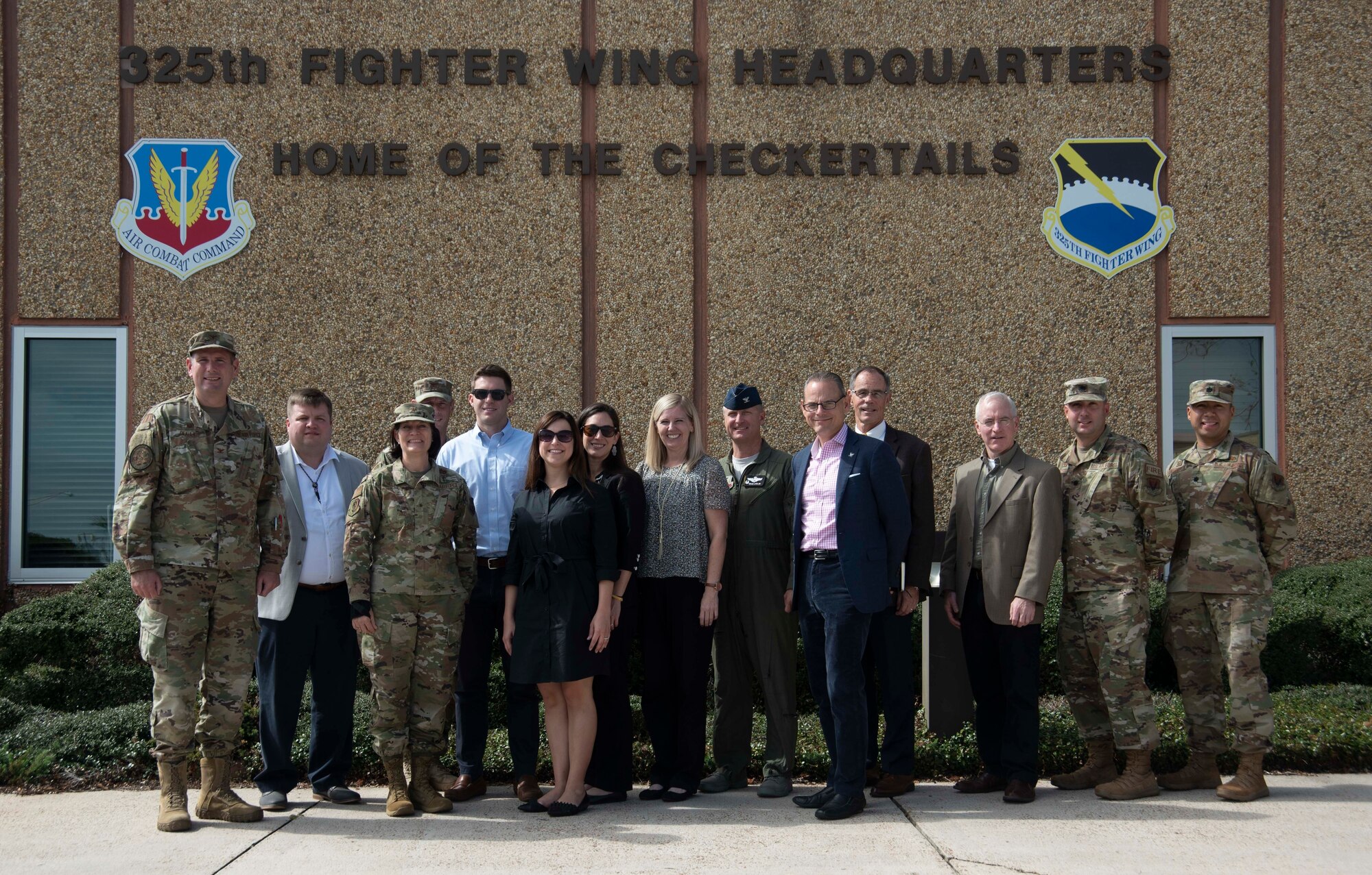 Members of the Senate Appropriations Committee, military members, and civilian partners, pose for a photo on Oct. 28, 2019, at Tyndall Air Force Base, Florida. The professional staff members toured the base with Col. Brian Laidlaw, 325th Fighter Wing commander and his leadership team, to see the progress Tyndall had made since the devastation caused from Hurricane Michael in 2018. Laidlaw said the base is back to having 90 percent of the missions, conducted by 80 percent of the personnel, utilizing 50 percent of the facilities. (U.S. Air Force photo by Staff Sgt. Magen M. Reeves)