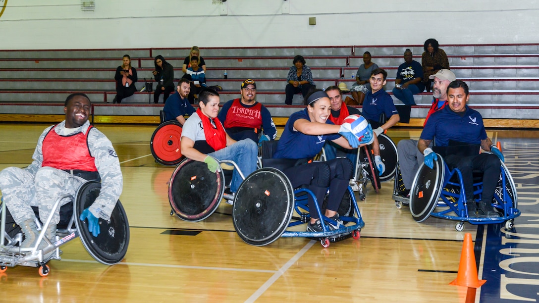 Team Edwards personnel participated in a game of wheelchair rugby at Edwards Air Force Base, California, Oct. 24. The game was a demonstration headed by the Triumph Foundation, a non-profit organization, in support of the base's observance of National Disability Employment Awareness Month. (U.S. Air Force photo by Giancarlo Casem)